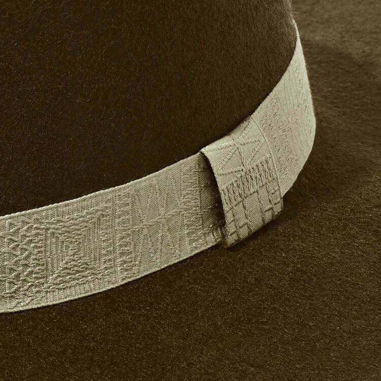 Custom ribbon trim for custom hat. Jacquard Pattern trim ribbon in Dark Olive custom color.